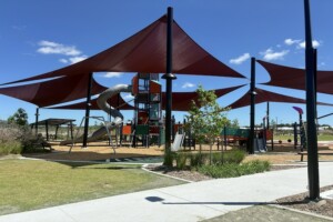 Shade sails over play equipment at Daybreak Park, Walloon.