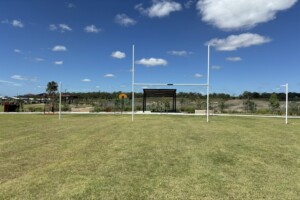 Goal posts on grassed area at Daybreak Park, Walloon.