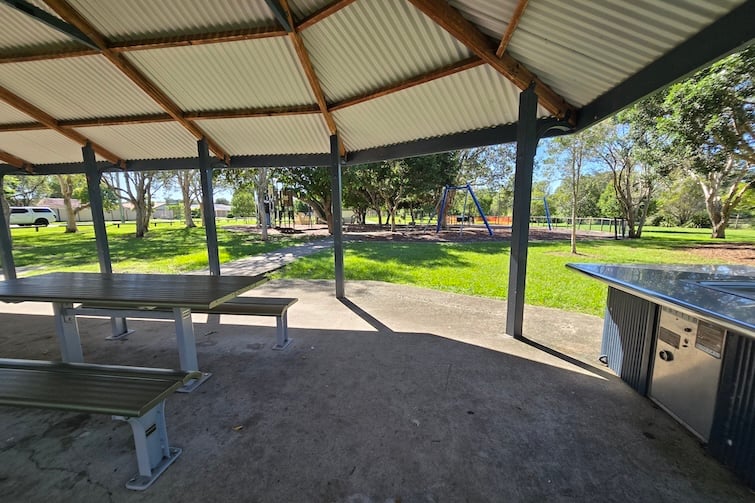 Picnic table and BBQ at Harold Kielly Park.