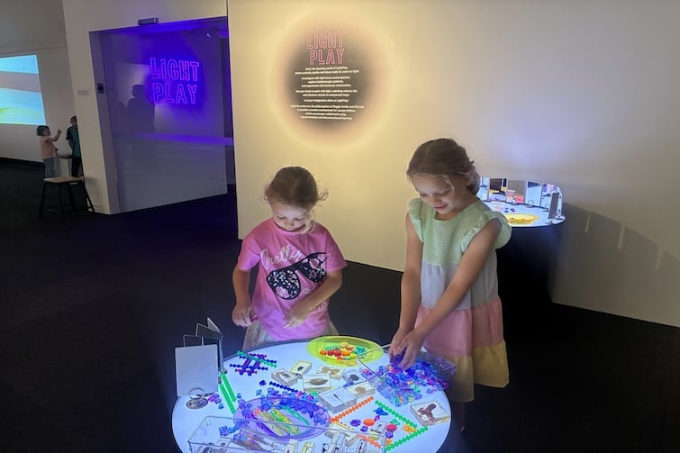 Children playing with coloured blocks at LightPlay, Ipswich Art Gallery.