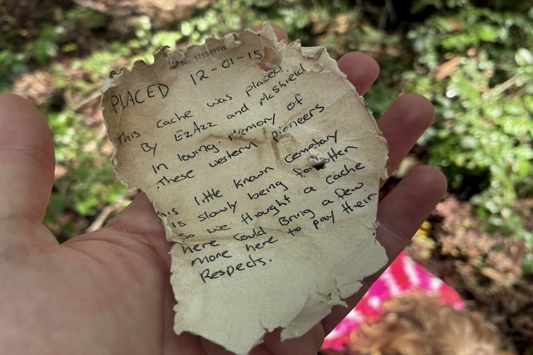 A tattered piece of paper found at Moggill Cemetery geocache location.