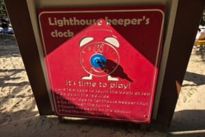 Lighthouse keepers clock play panel at Happy Valley Playground in Caloundra.