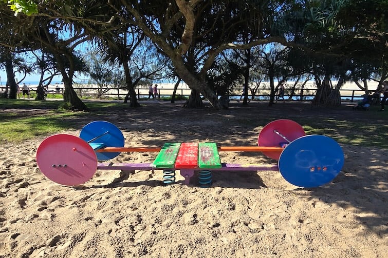 Colourful seesaw at Happy Valley Playground in Caloundra.