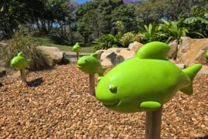 Green fish sculptures at Colmslie Beach Reserve.