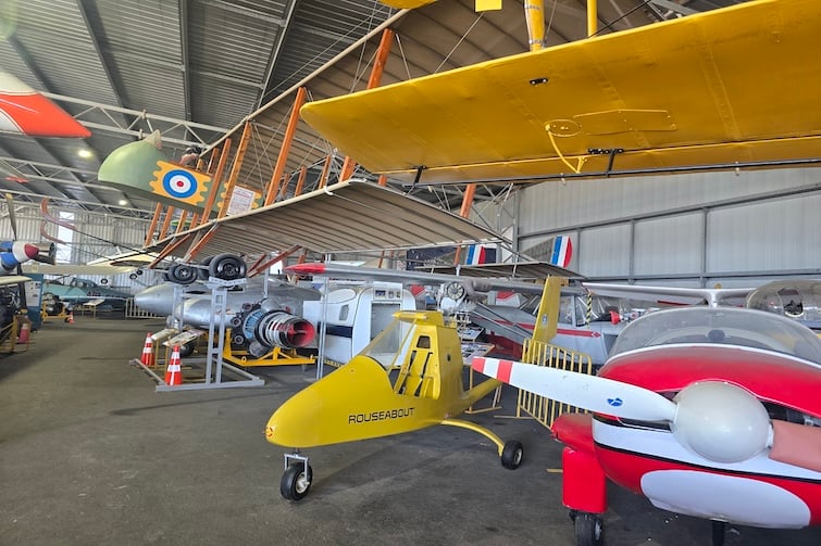 Several planes on display inside a hangar at Queensland Air Museum, Caloundra.