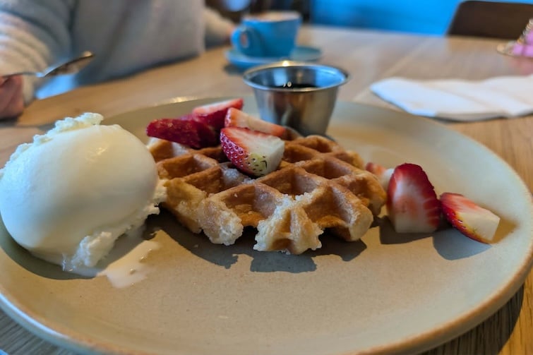Waffles and ice cream on a plate at The Full Moon Hotel, Sandgate.