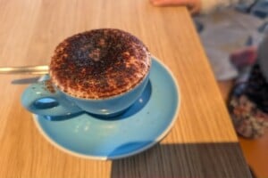 Babycino in blue mug at The Full Moon Hotel, Sandgate.