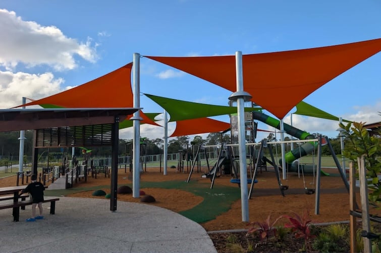 Shade sails covering play fort at Thistle Place Park, Palmview.