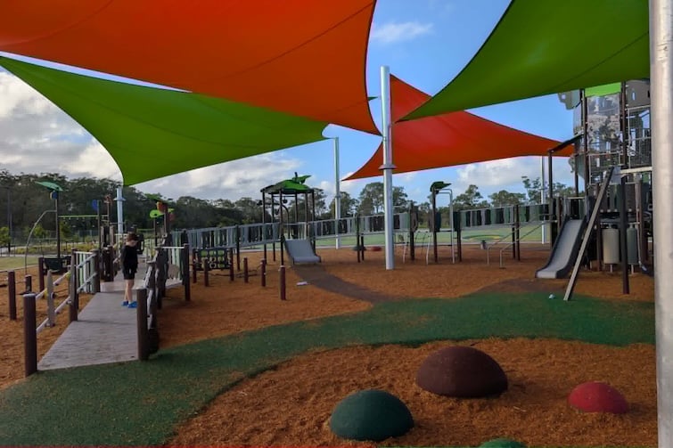 Shade sails covering play fort at Thistle Place Park, Palmview.