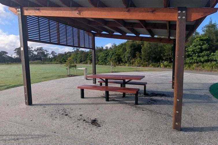 Picnic table and shelter at Thistle Place Park, Palmview.