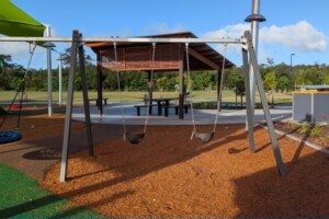 Toddler swings at Thistle Place Park, Palmview.