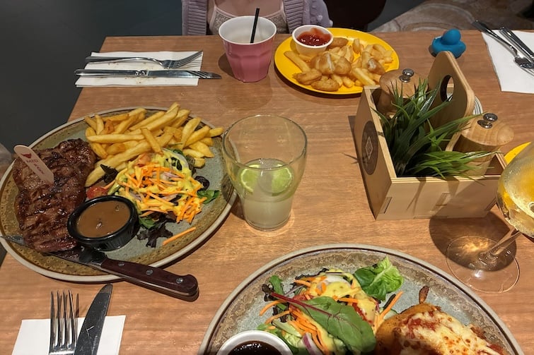 Meals on a table at Bellbowrie Tavern.