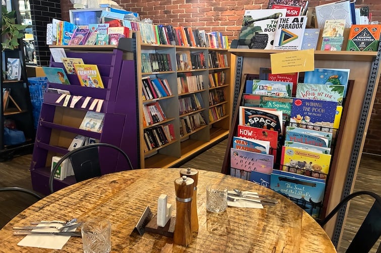 Book shelves and a table at Chapters Book Shop Cafe, Karalee.