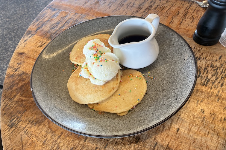 Pancakes on a plate at Chapters Book Shop Cafe, Karalee.