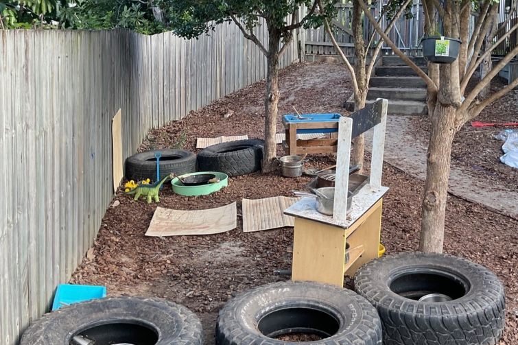 Nest Montessori Children's House outdoor mud kitchen.