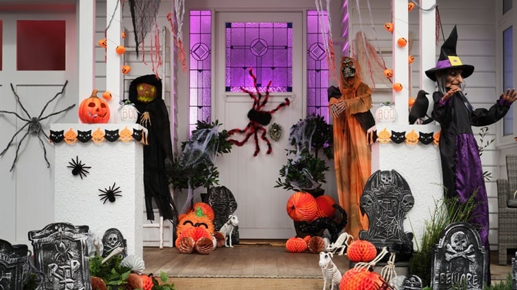entry of house decorated for halloween. 