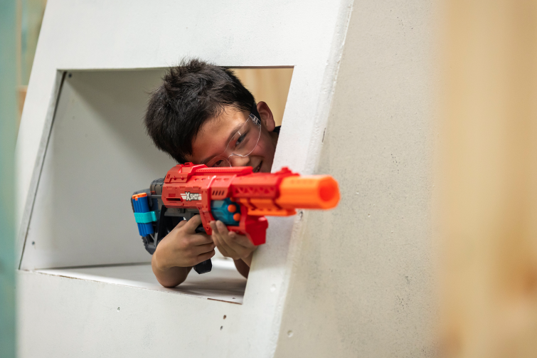 Spec Ops Paintball Nerf battle hiding.
