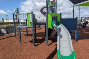 spiral slide and green playground.