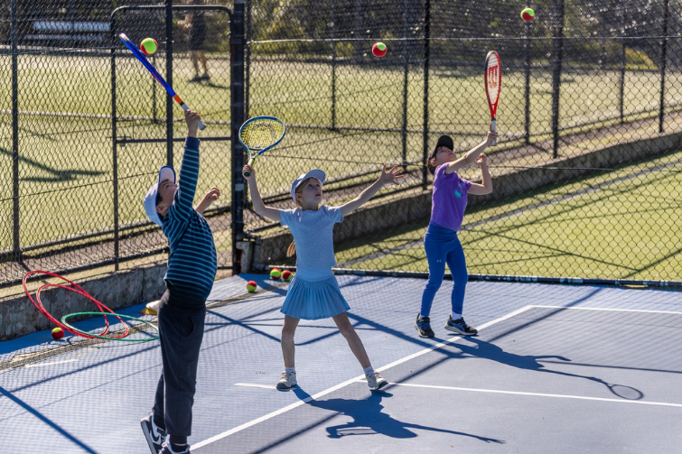 voyager tennis teenagers playing.